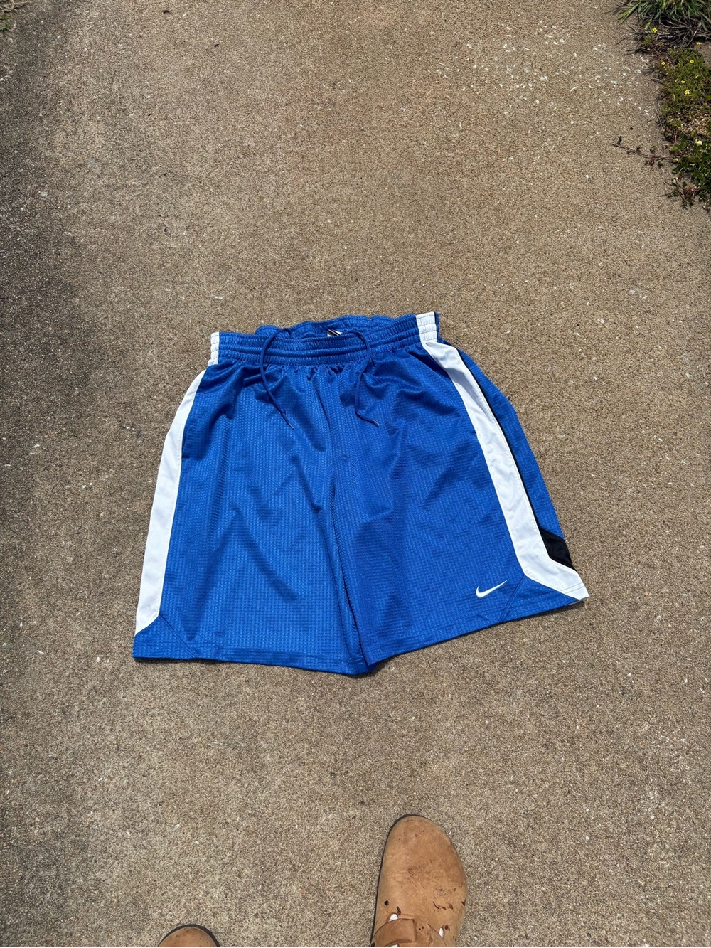 Nike blue and white baggy athletic shorts